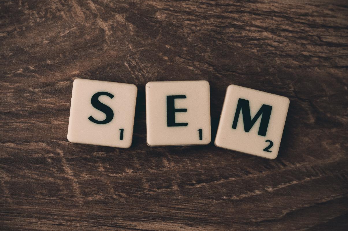 Scrabble pieces that spell out SEM